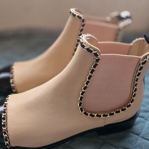Chic Chain-Trimmed Ankle Boots in Cream and Black